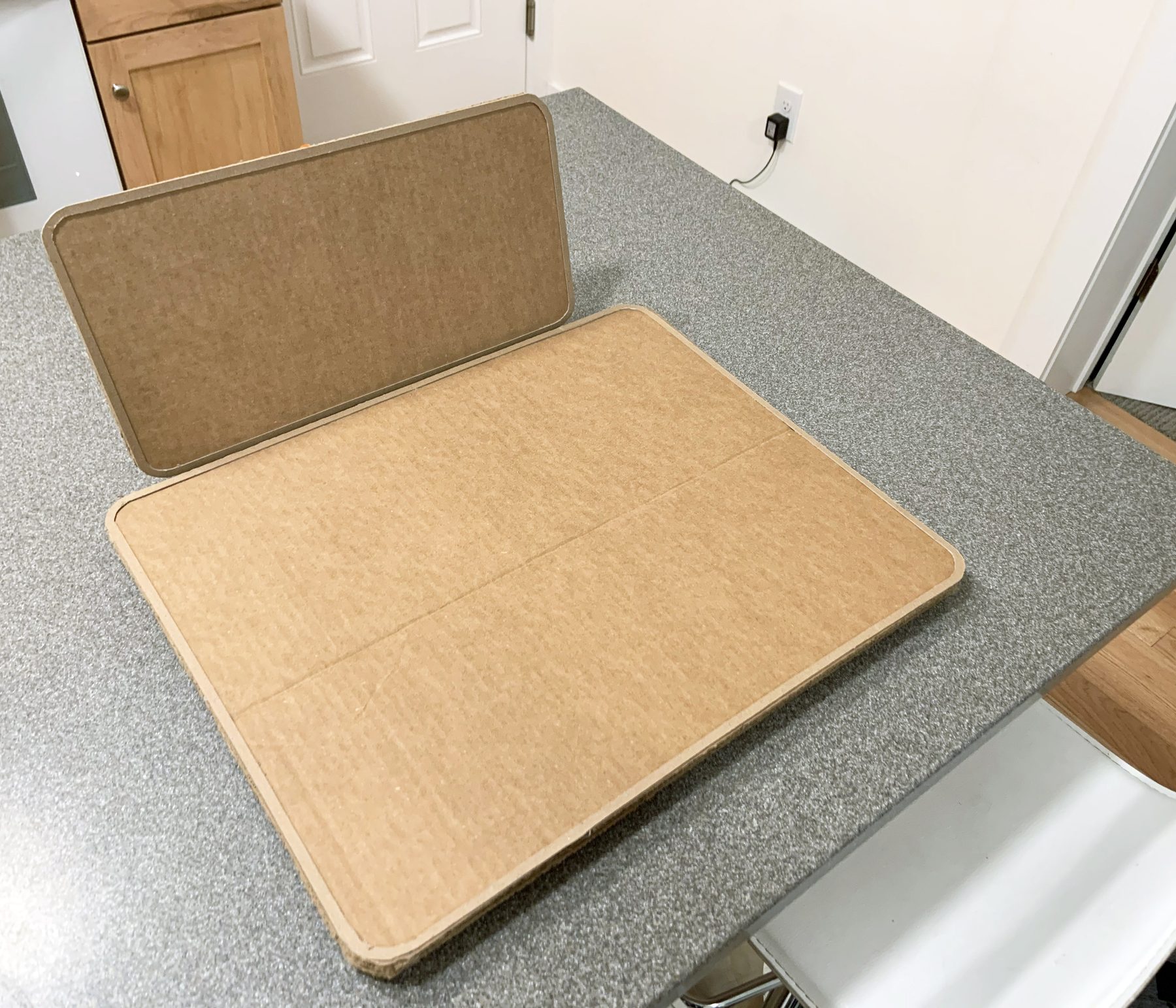 Full-scale cardboard mockup of the board and second screen