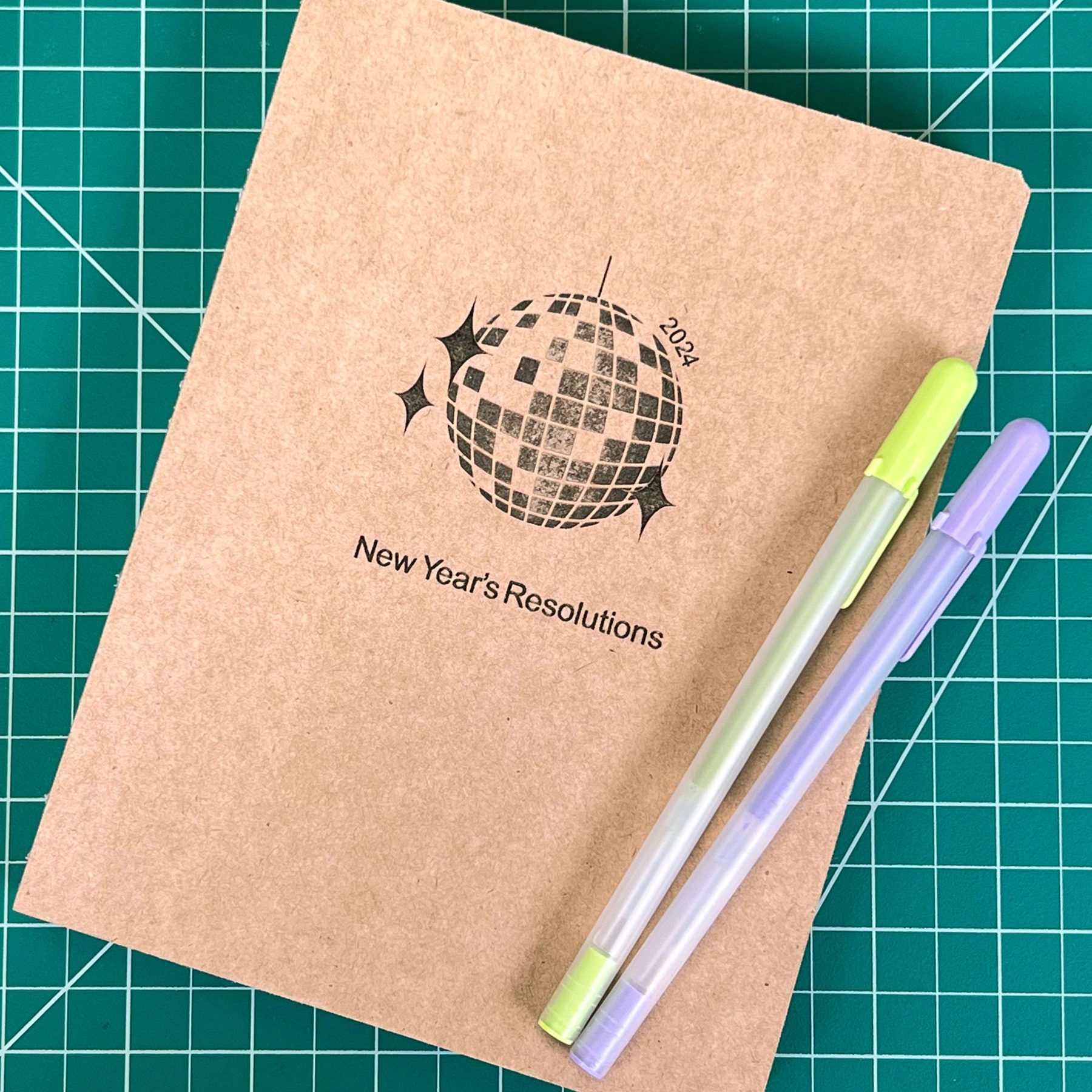 Engraved kraft New Year's Resolutions journal